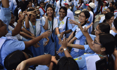Explore why boys lag behind girls: PM