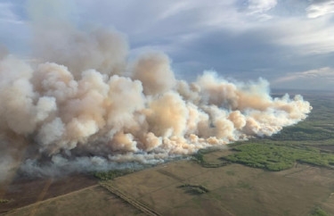 Early forest fires prompt evacuations in Canada