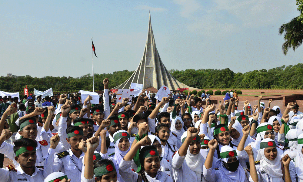 School students gather on the premises of National Martyrs' Memorial in Savar. Photo : Muktadir Mokto