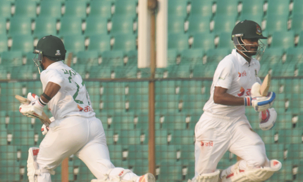 Jakir Hasan (L) and Mahmudul Hasan Joy (R) run between the wickets during the second day of the second Test cricket match between Bangladesh and Sri Lanka at the Zahur Ahmed Chowdhury Stadium in Chittagong on March 31, 2024. Photo : Rafiqur Rahman Raqu
