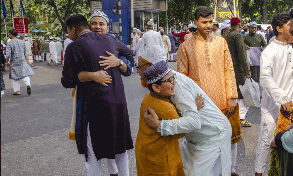 Muslims extend greetings after Eid jamaat at the National Eidgah on the High Court premises. Photo : Muktadir Mokto