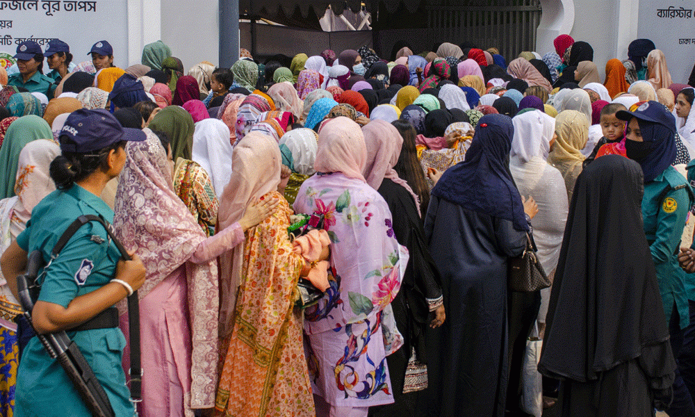 Women entre at the National Eidgah to participate in the main Eid jamaat. Photo : Muktadir Mokto