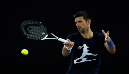 Djokovic romps in first singles clash in Australia since deportation