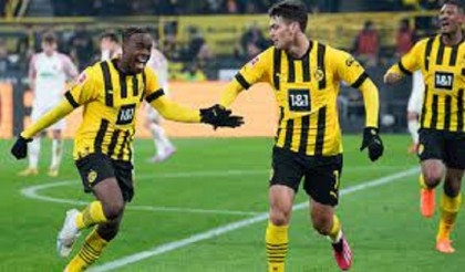 Dortmund beat Augsburg on Haller's return from cancer