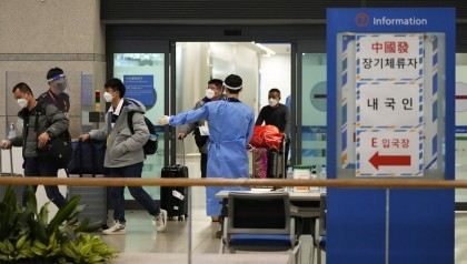 South Korea extends restrictions on travelers from China
