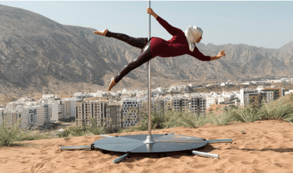 An elegant, and rare, portrait of a pole dancer in Oman