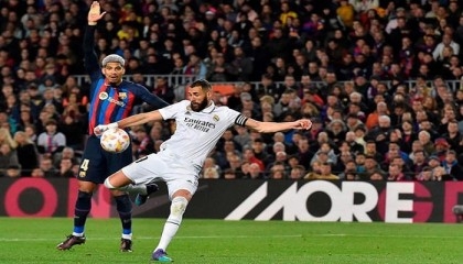 Benzema hits treble as 'complete' Madrid smash Barca to reach Copa final