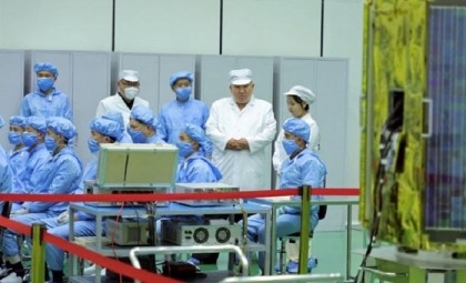 Kim inspects NKorea's first spy satellite: state media