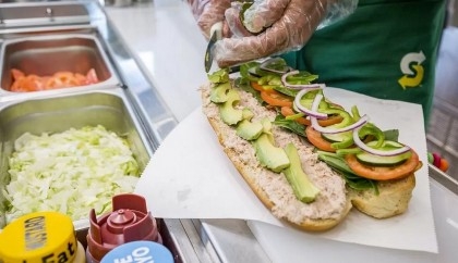 Subway sandwich chain bought by Dunkin' investor