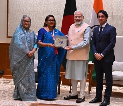 Saima Wazed presents souvenir to  Modi in presence of PM Hasina