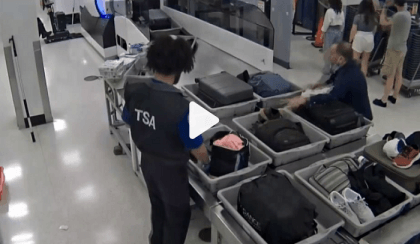 CCTV shows US airport staff appear to be stealing from hand luggage