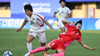North Korea thrash South at Asian Games as rivalries take centre stage

