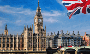 UK unveils tougher visa rules to cut migration