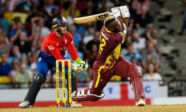 Russell shines as West Indies beat England in first T20