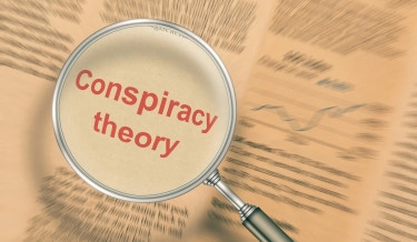 Positive contact reduces belief in conspiracy theories
