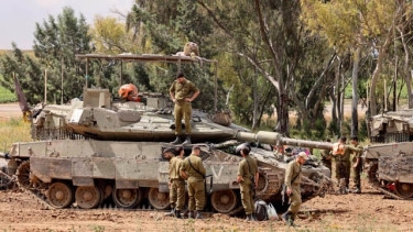 Israel on alert after Iranian threat as Gaza war grinds on