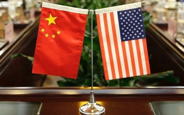 US, China defense chiefs hold first talks in nearly 18 months