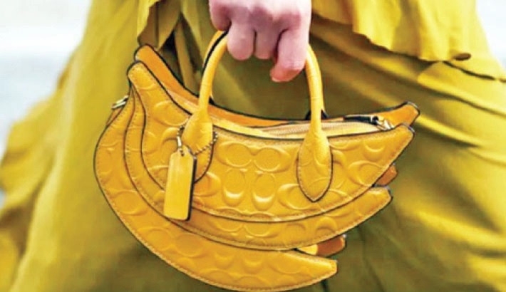 US watchdog sues to block $8.5b handbag takeover