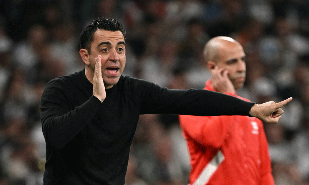 Xavi to remain Barcelona coach