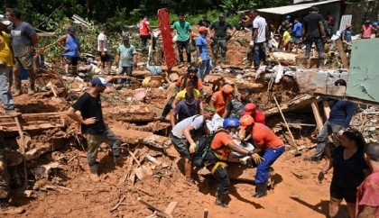 Frantic search for dozens missing in Brazil floods