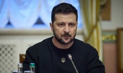 Zelensky visits frontline, deadly Russian strikes hit school, homes