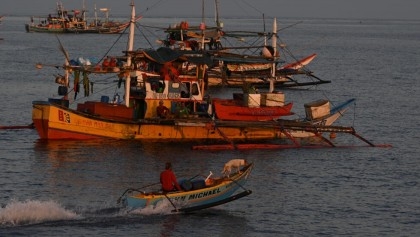 Philippines vows removal of Chinese barriers at disputed reef