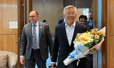 Donald Lu arrives in Dhaka