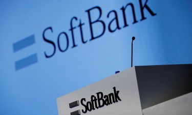 Japan’s SoftBank narrows full-year loss