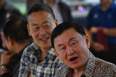 Ex-Thai PM Thaksin to face trial for royal insult