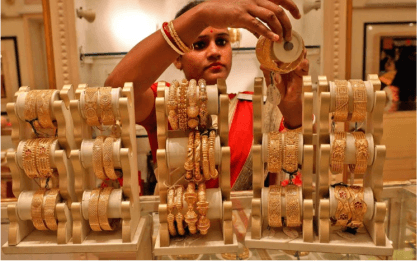 Indian gold prices hit record high, dampening demand –dealers