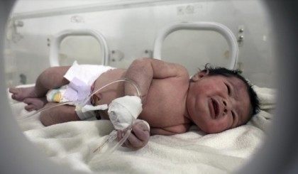 Newborn saved from rubble in quake-hit Syria in good health