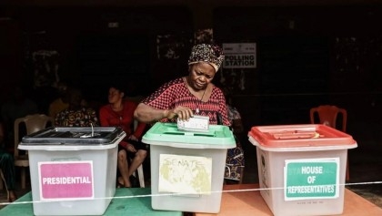 Nigerians vote for new president in tight election race