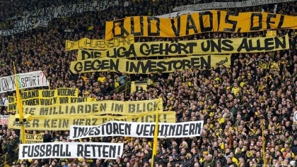 German football clubs block league's investment plan
