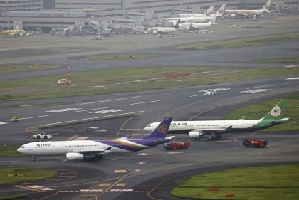 Runway closed at Tokyo's Haneda airport after 2 planes bump into each other


