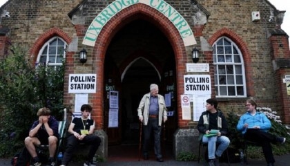 Ruling UK Conservatives suffer vote routs but avoid wipeout