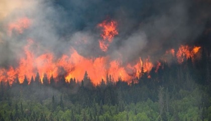 Third firefighter dies battling massive blazes in Canada