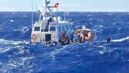 Stranded migrants saved, but dozens missing off Italy in rough seas