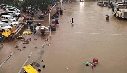 Four dead, dozens missing in China rainstorms