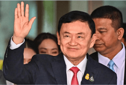 Thai king cuts ex-PM Thaksin's jail term to one year: govt