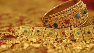 Gold price inflates further, continues record
