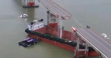 Two killed as cargo ship hits bridge in China