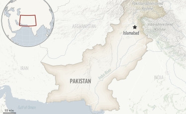 Heavy winter rains in Pakistan kill at least 29 as buildings collapse and landslides block roads